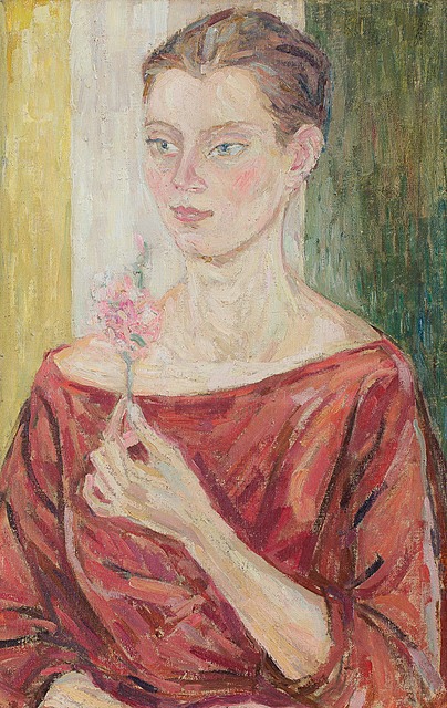 Portret kobiety z kwiatem