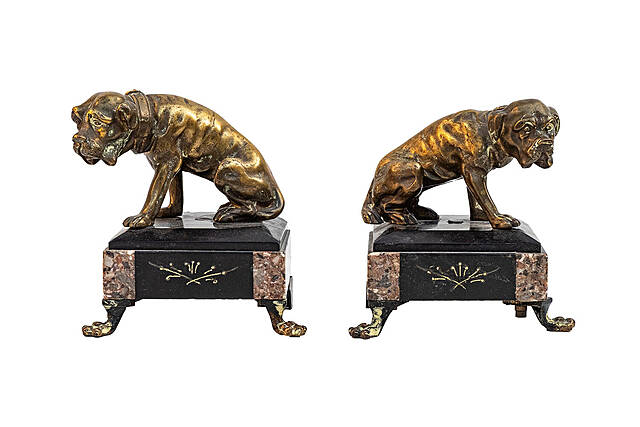 Dwa psy jako podpórki do książek