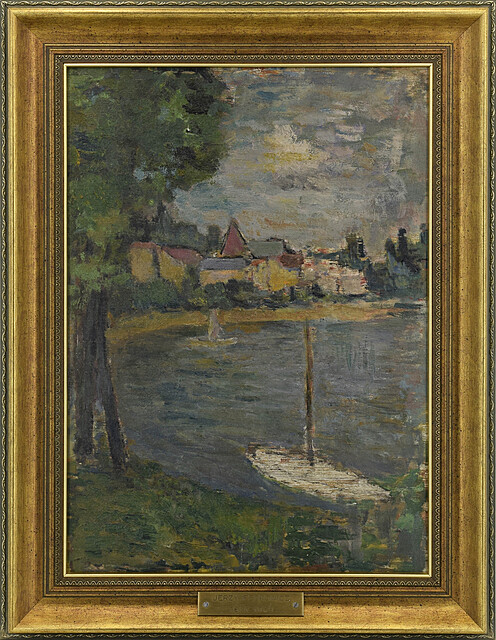 Biała łódź w zatoce