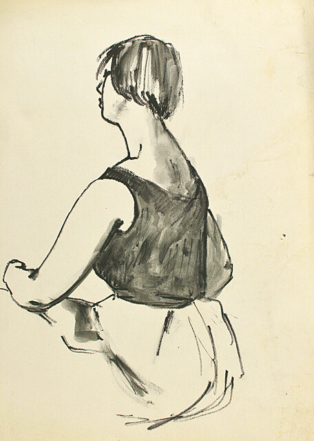 Siedząca kobieta ukazana bokiem