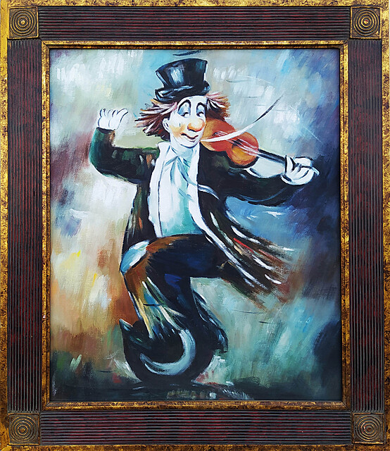 Clown na monocyklu