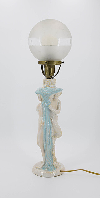 Lampa z trzonem z faunem i nimfą