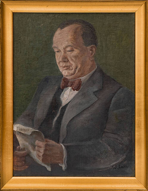 Portret mężczyzny w czerwonej muszce